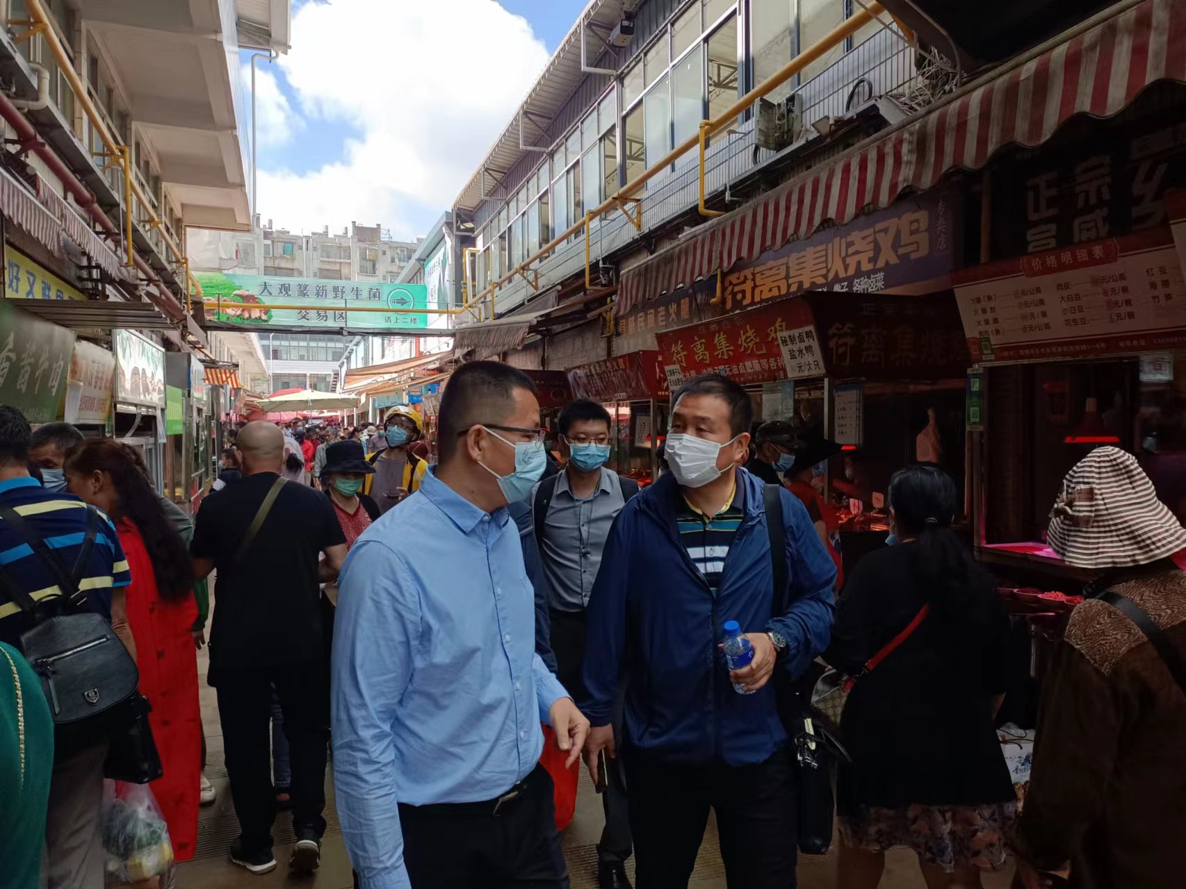 王紅國率邦元公司到篆新農貿市場考察交流